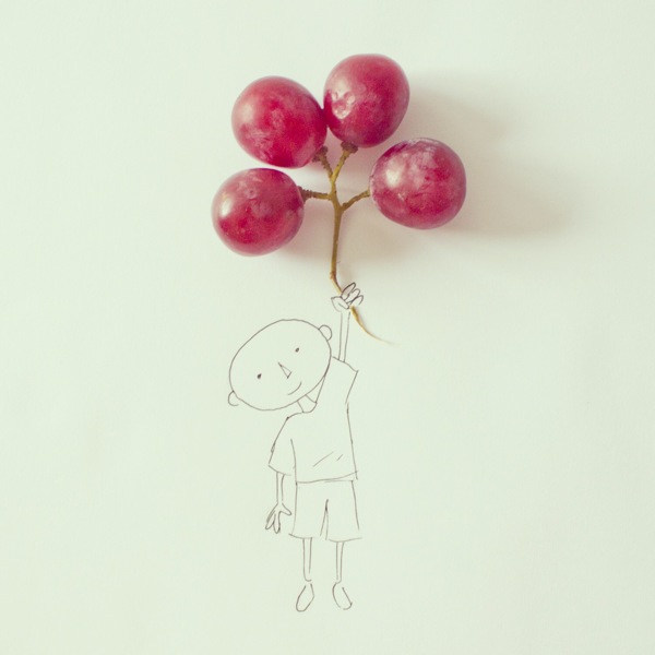 javier-perez - petit enfant qui s'envole avec des grains de raisins